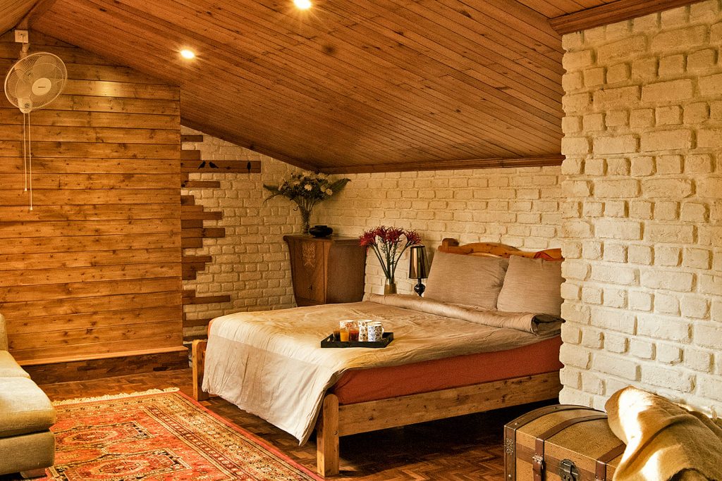 Wooden interiors of holiday villa bedroom
